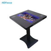 Taula de cafè interactiva amb pantalla tàctil